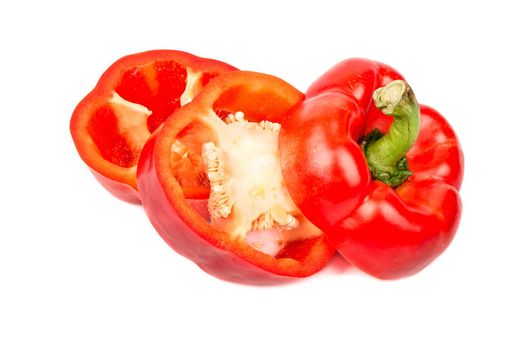 Cut fresh pepper on three slices on white background