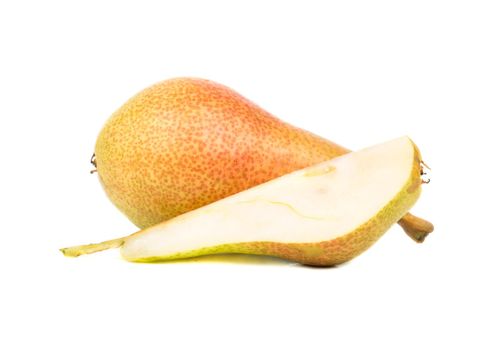 Fresh pear with a juicy slice on a white background