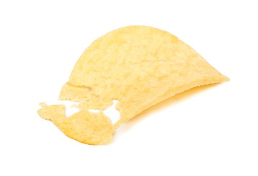 Potato chips broken into pieces on a white background