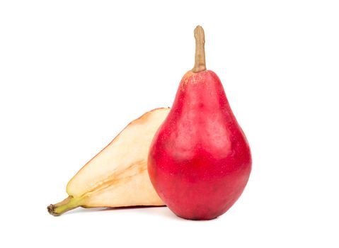 Fresh red juicy pear with half on white background