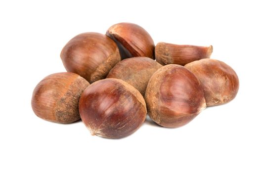 Small bunch of fresh edible chestnuts on a white background