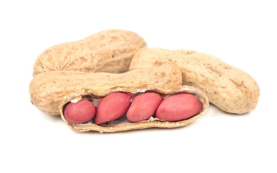 Peanut in open shell isolated on white background