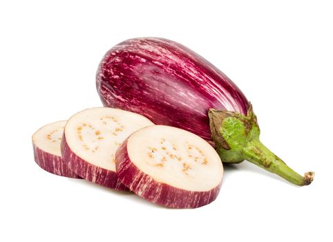 Fresh purple eggplant with slices on white background