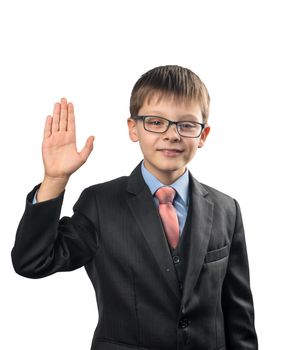 Cheerful schoolboy with glasses waving his hand on a white background