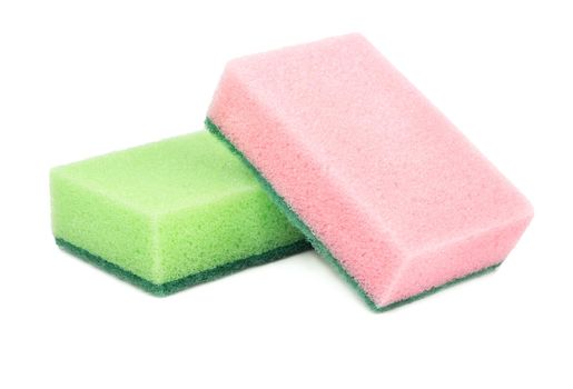 Green and pink dish washing sponge on white background