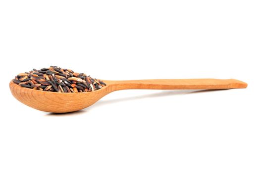 Black rice in wooden spoon on white background