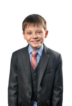 Portrait of a cheerful schoolboy in blazer on white background