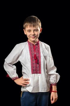 Portrait of a boy in a white traditional Ukrainian shirt