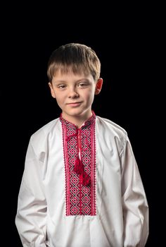 Portrait of a boy in a white traditional Ukrainian shirt