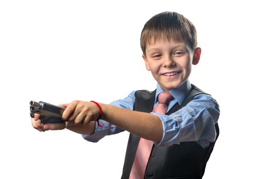 Boy reloads a gun on a white background