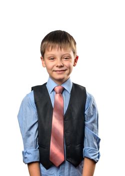 Portrait of a cute schoolboy on a white background