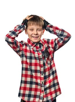 Portrait of a beautiful boy in a shirt on a white background