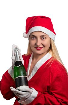 Portrait of a girl Santa with a bottle in his hand on white background