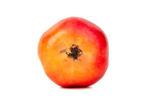 Little red paradise apple isolated on white background closeup