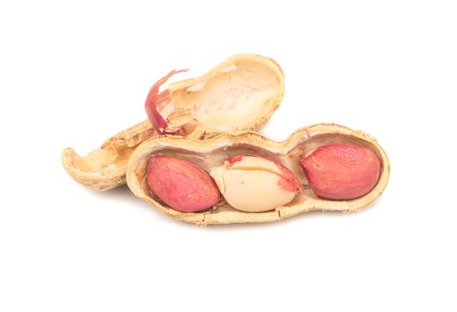 Opened peanut in shell on a white background
