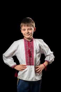 Portrait of a boy in a white traditional Ukrainian shirt