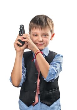 Boy holds a gun in his hands on a white background