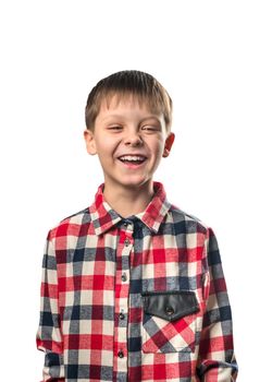 Laughing boy in a shirt on a white background