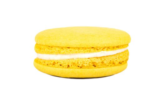 Yellow lemon macaroon isolated on white background