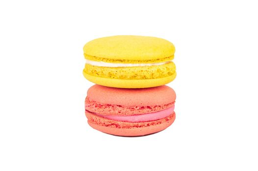 Lemon and raspberry macaroons isolated on white background