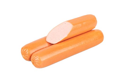 Two fresh sausages with half on a white background