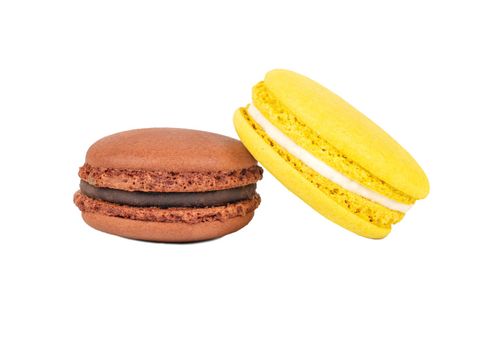 Brown and yellow macaroon isolated on white background