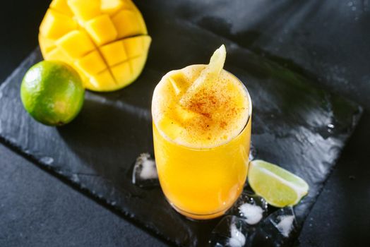 Mexican or Latin American cuisine. The classic Mexican and Southern U.S. cocktail is the Mangonada. A refreshing cocktail of mango salt and lime and chili peppers. Mangonada mexican mango smoothie with chamoy sauce and chili lime seasoning and tamarind candy straw