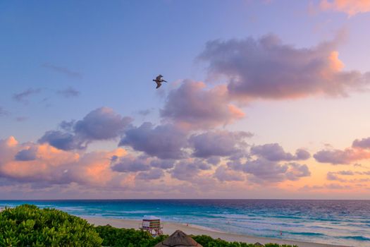 Dawn on the Caribbean Sea. Clear sky with small clouds. Clear weather.