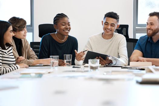 a group of business people during a meeting.