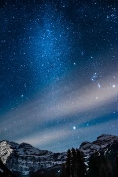 panorama of milky way with the wildstubel massiv in the background. High quality photo. The photo was taken in Lenk which lies in the simmenvalley.