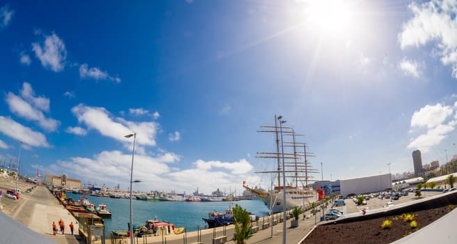 February 04 2022-Las Palmas, Gran Canaria, Spain .View on the Port of Las Palmas, Gran Canary with many kinds of passenger and cargo ships in the background and foreground