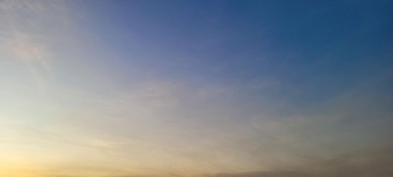 image of colorful sky with dark clouds in late afternoon in Brazil