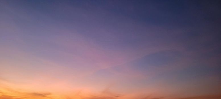 image of colorful sky with dark clouds in late afternoon in Brazil