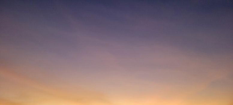 image of colorful sky with dark clouds in late afternoon in Brazil