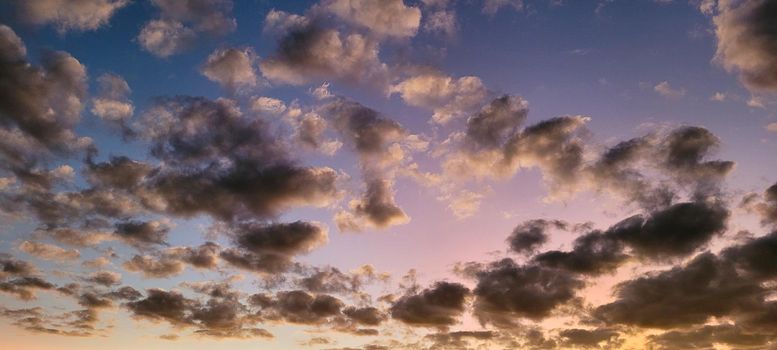 image of colorful sky with dark clouds in late afternoon in Brazil