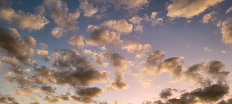 image of colorful sky with dark clouds in late afternoon in Brazil