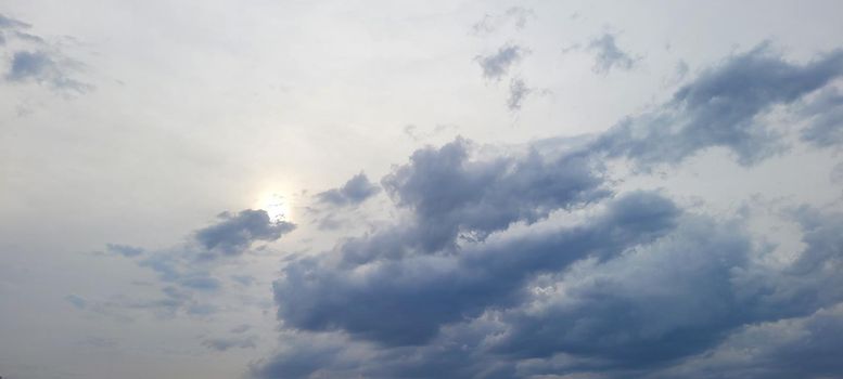 image of colorful sky with dark clouds in late afternoon in Brazil