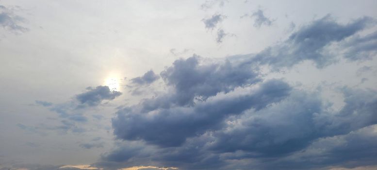 image of colorful sky with dark clouds in late afternoon in Brazil