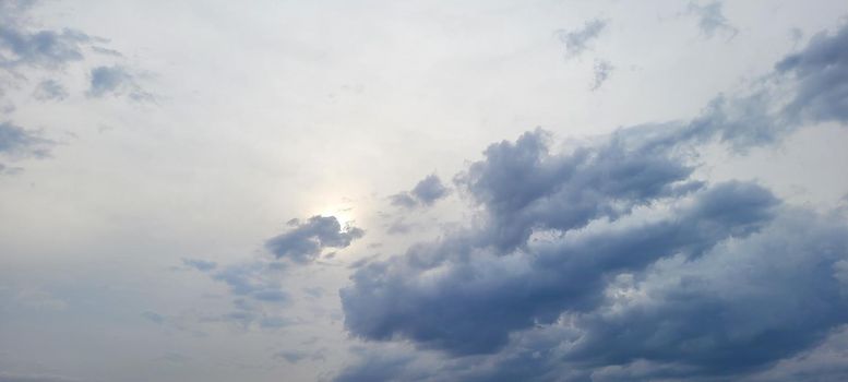 image of colorful sky with dark clouds in late afternoon in Brazil