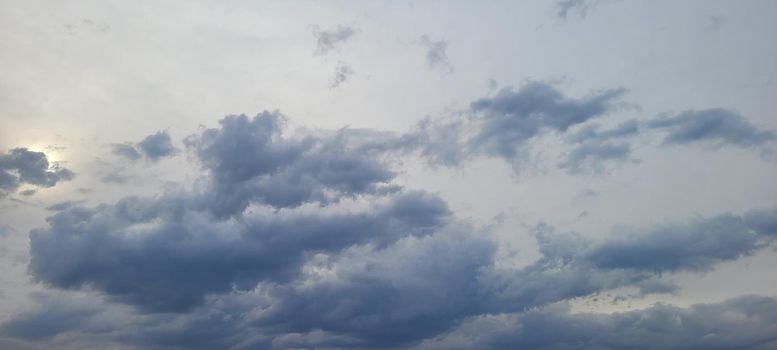 image of colorful sky with dark clouds in late afternoon in Brazil