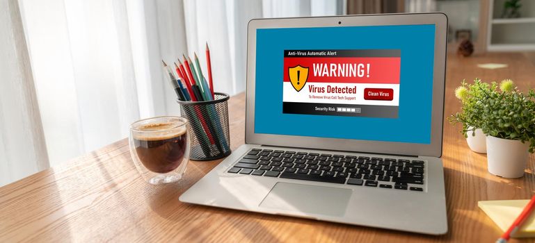 Virus warning alert on computer screen detected modish cyber threat , hacker, computer virus and malware