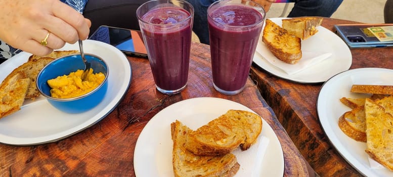 breakfast table with coffee and food