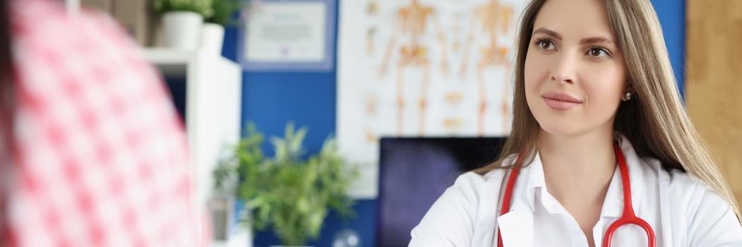 Portrait of qualified female doctor give tablets to patient for faster recovery. Woman on appointment get advice from professional. Medicine, help concept