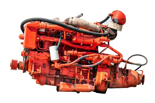 Old red diesel engine of a boat, isolated on white background.