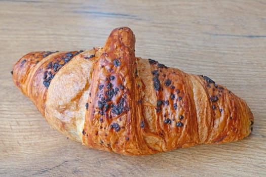 Close-up on a fresh tasty croissant. Fresh bakery