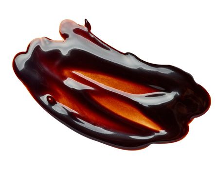 close up of a chocolate stain on white background