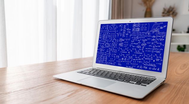 Mathematic equations and modish formula on computer screen showing concept of science and education