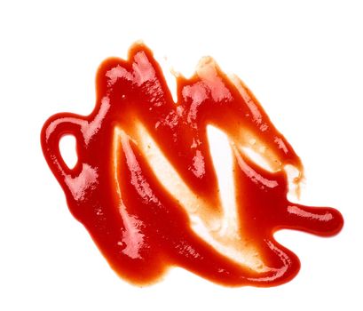 close up of a ketchup stain on white background