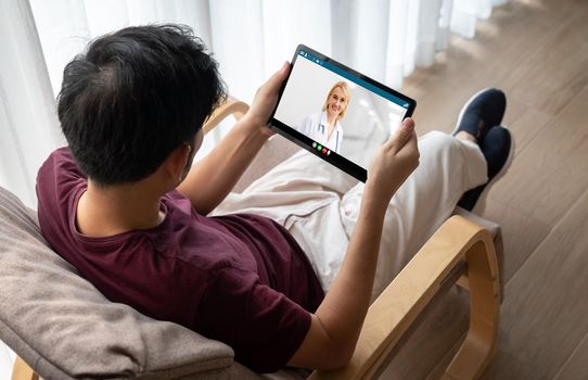 Doctor video call online by modish telemedicine software application for virtual meeting with patient