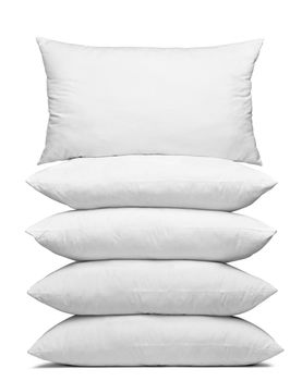 close up of a white pillow on white background